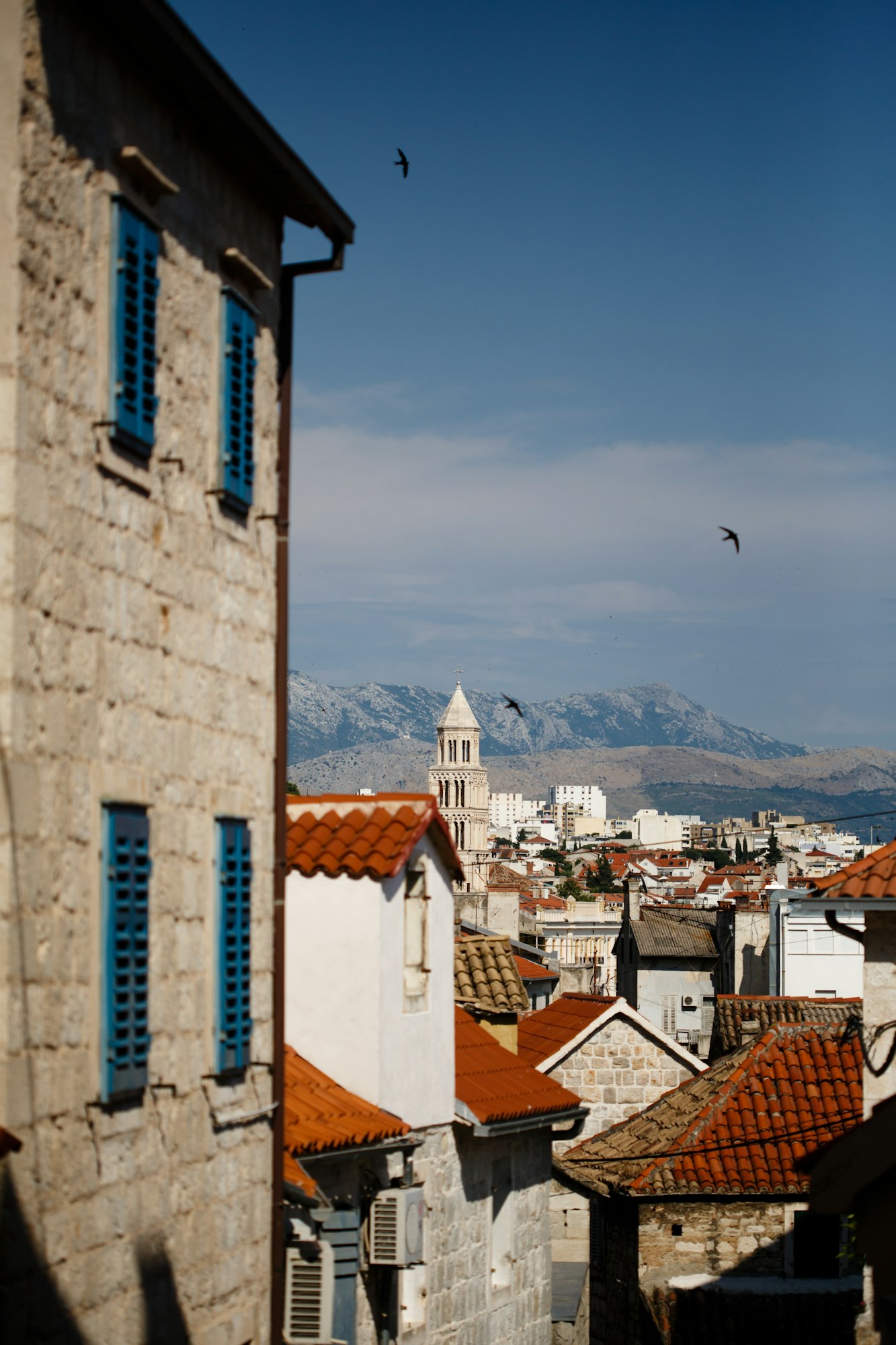 Touristic panoramic view on the old town of Split, Croatia with red roofs